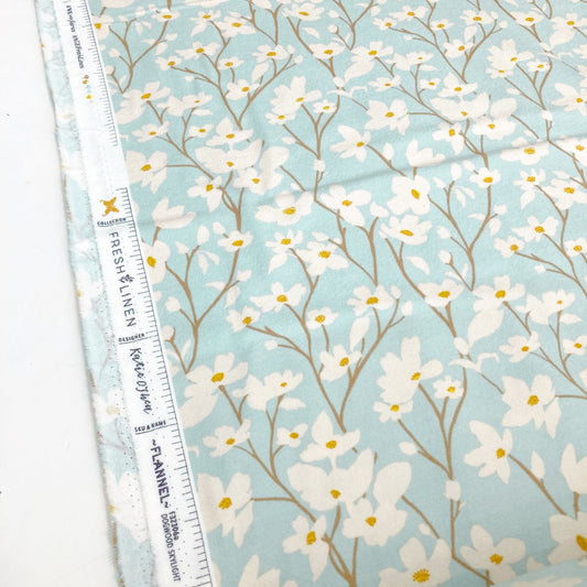 Floral cotton flannel on a light blue background