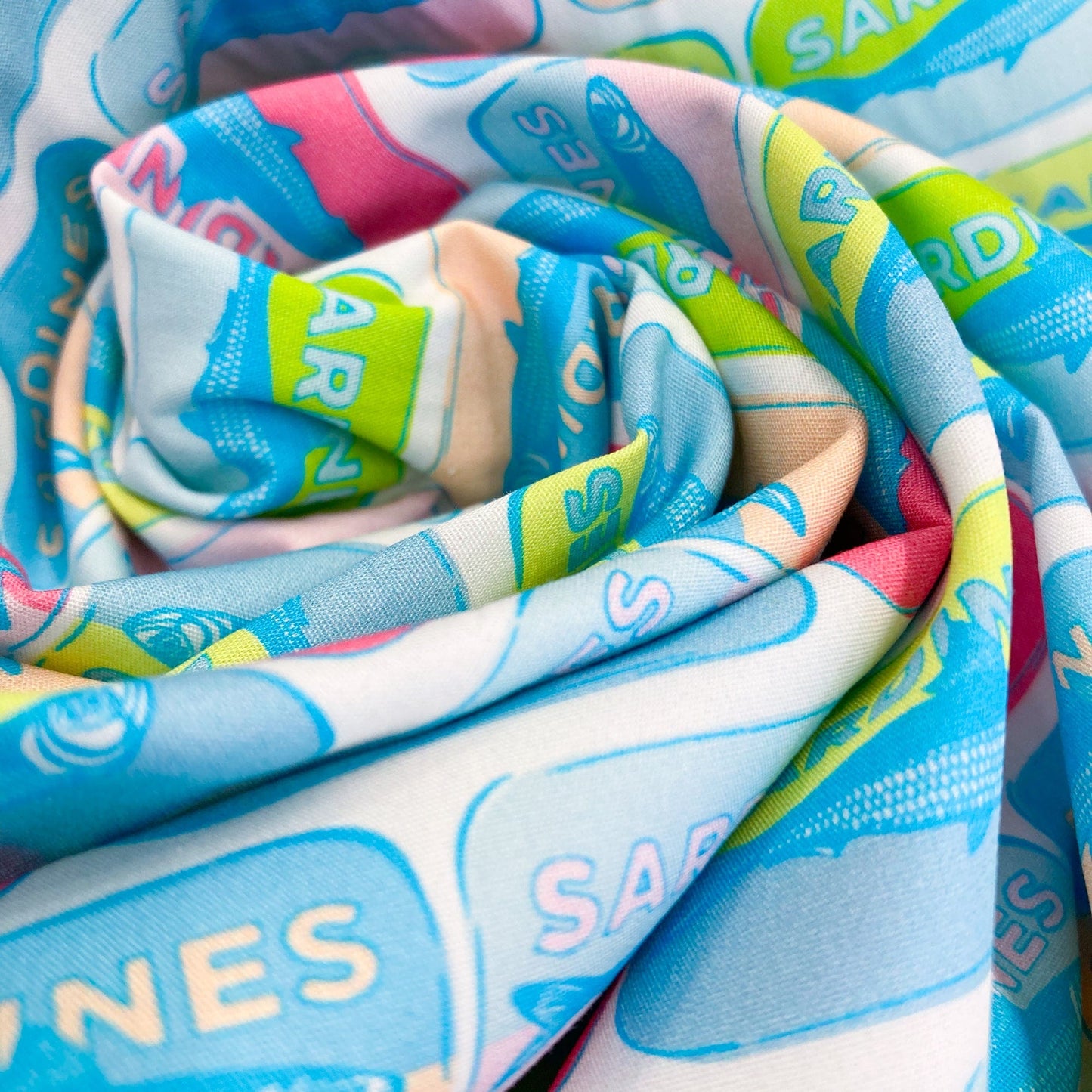 Swirl of Art Gallery Fabrics quilting cotton with colorful pop-art style sardine tin pattern