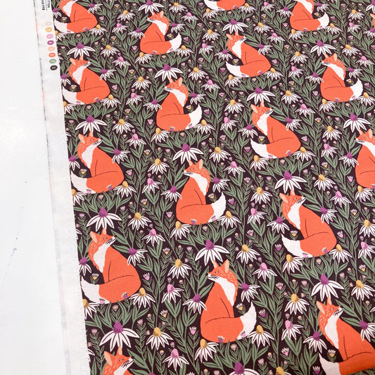 Organic quilting cotton with fox and floral pattern.