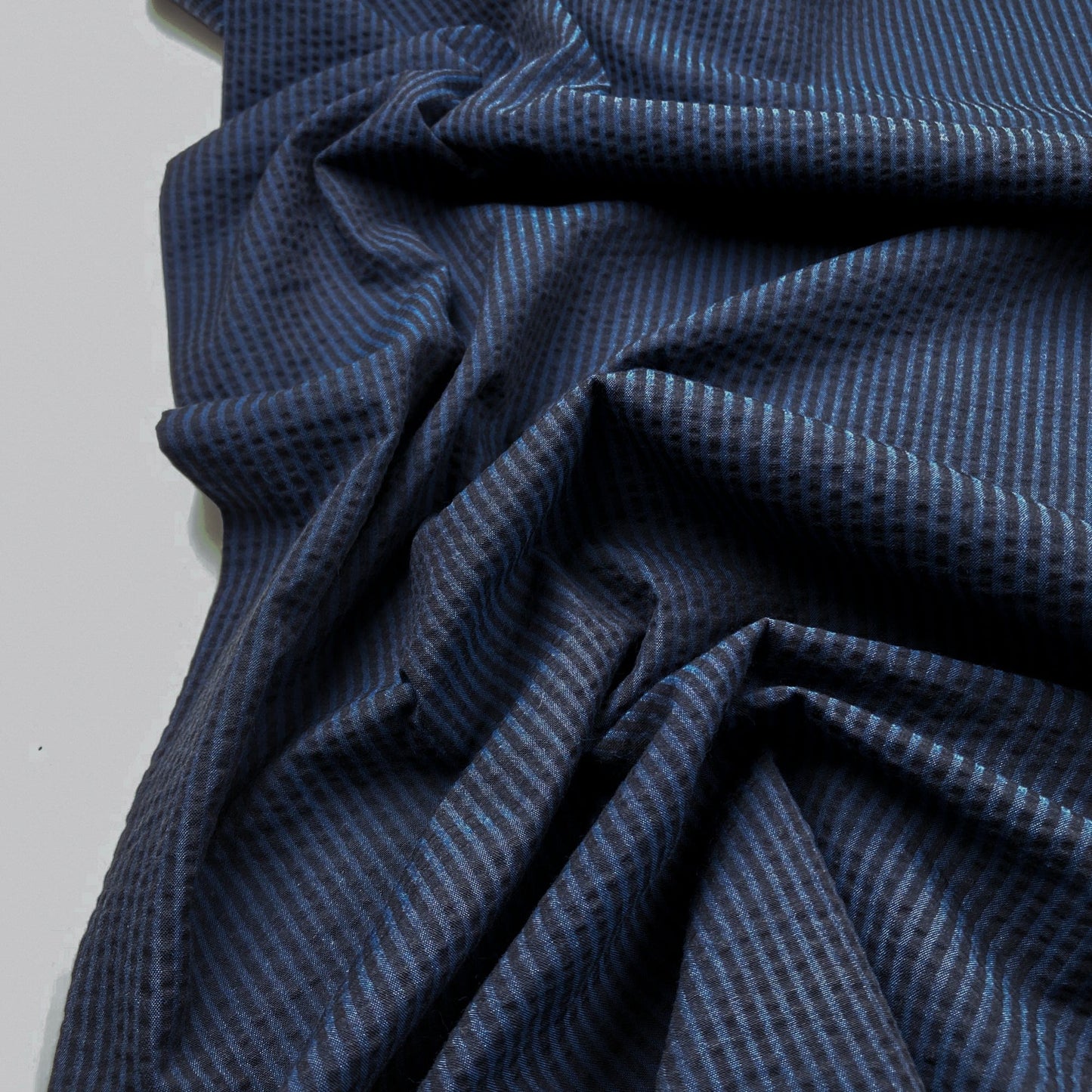 Close-up of blue cotton seersucker fabric