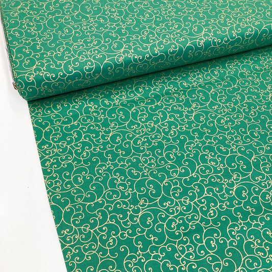 Green quilting cotton with celtic style metallic gold swirl pattern