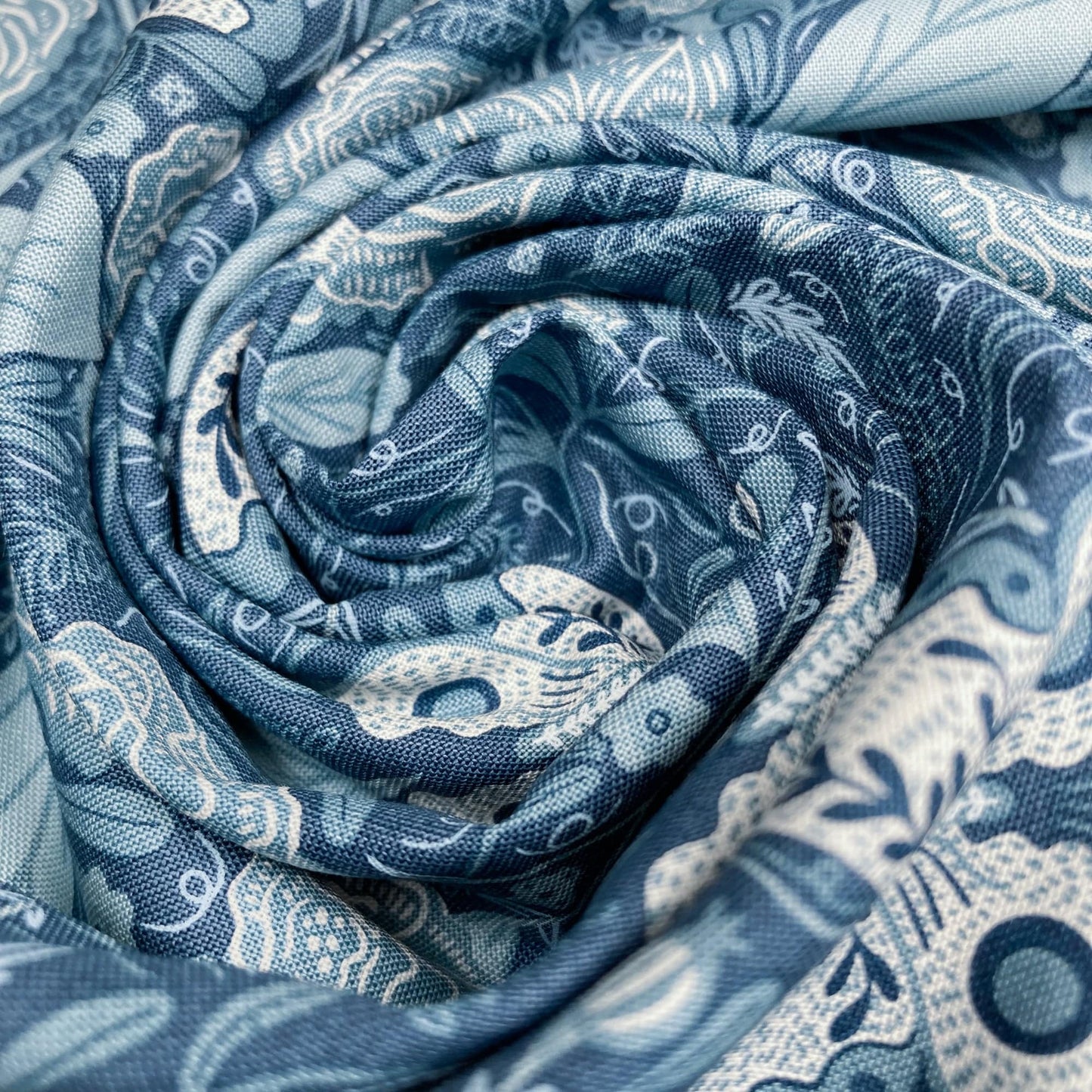 Swirl of blue and white patterned fabric