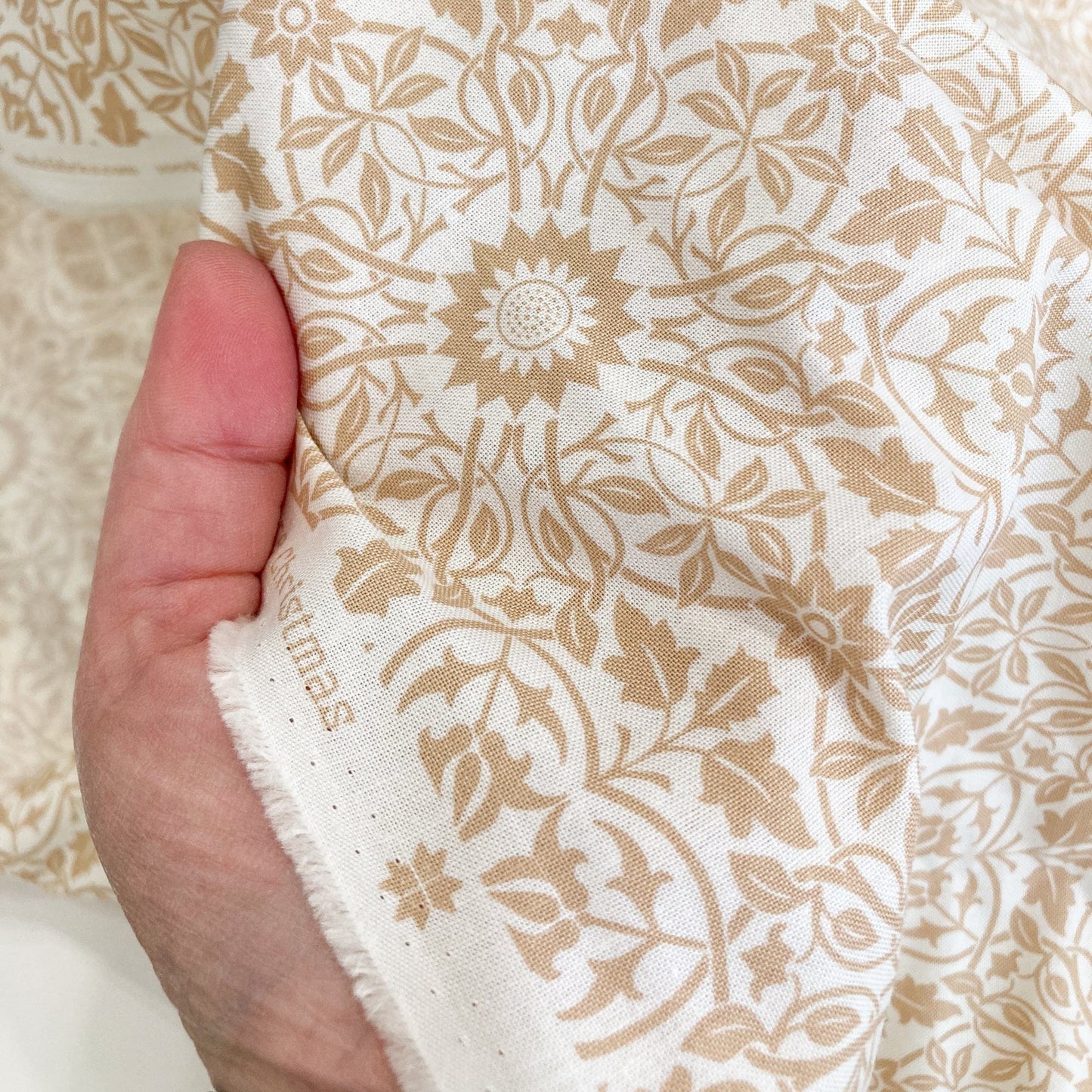 Moda Quilting Cotton 'Christmas Stitched' in Linen