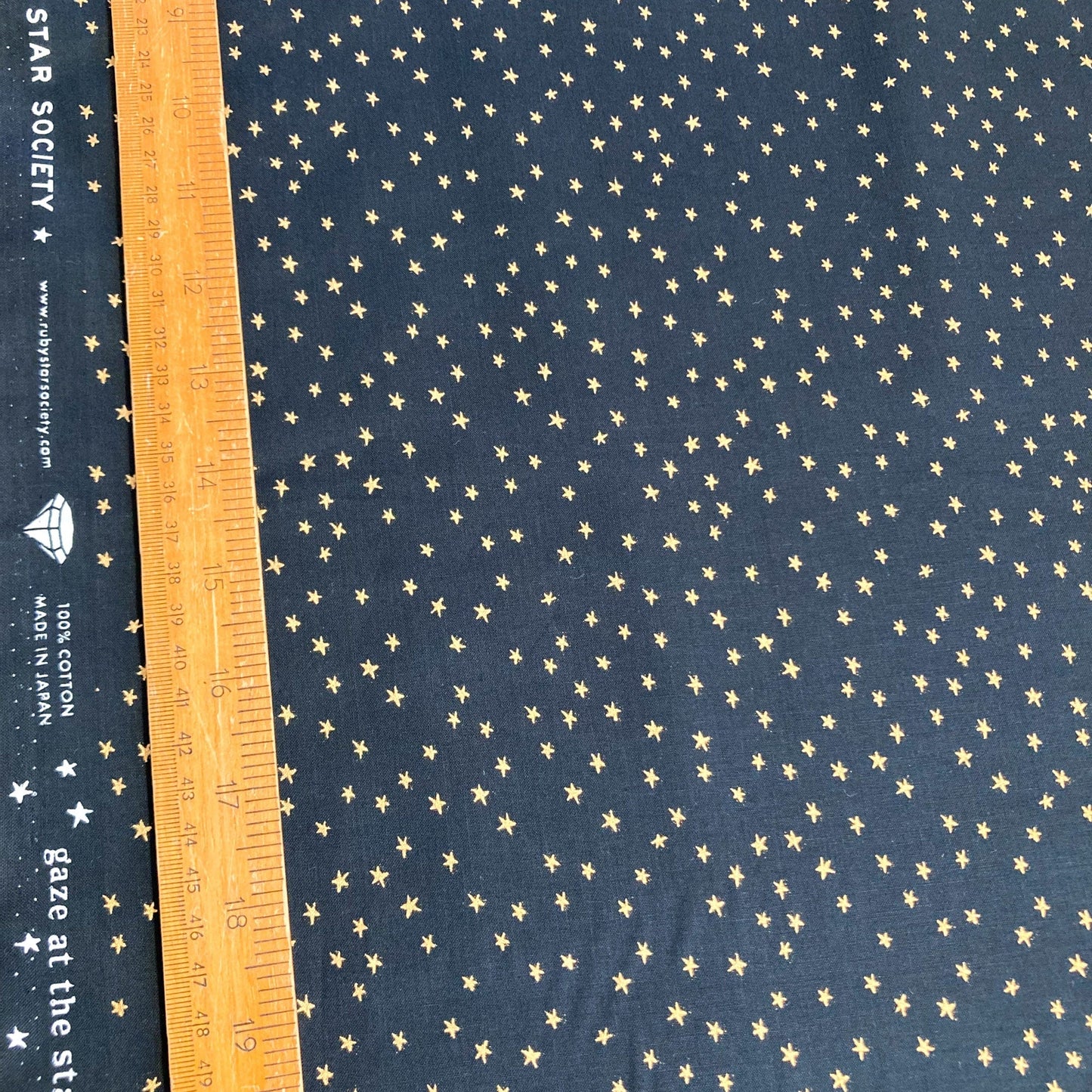 Ruby Star Society Quilting Cotton 'Mini Starry' in Black and Gold