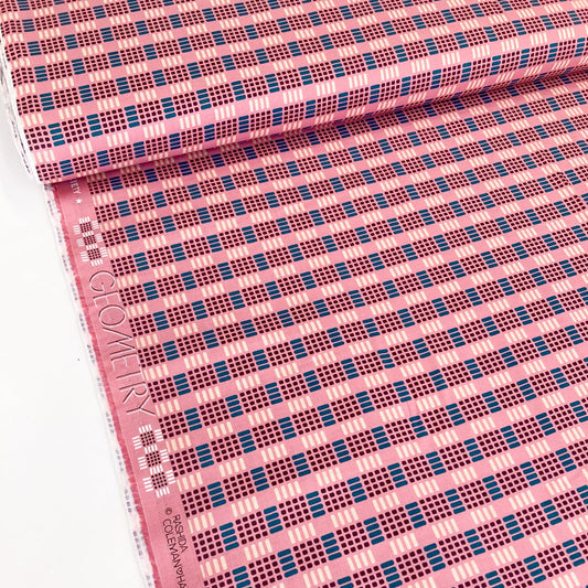 Plum coloured quilting cotton fabric with geometric pattern