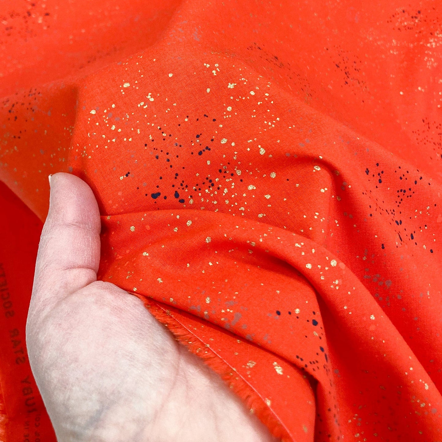 Ruby Star Society 'Speckled' Quilting Cotton in 'Poinsettia' (Metallic)