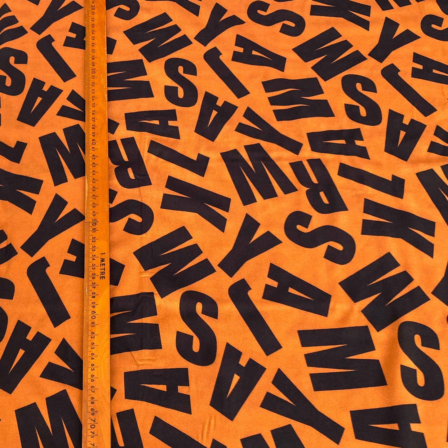 Fine Viscose in Rust Brown with Letter Print