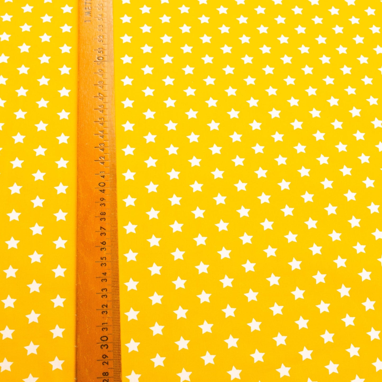 Cotton Poplin in Yellow with Star Print