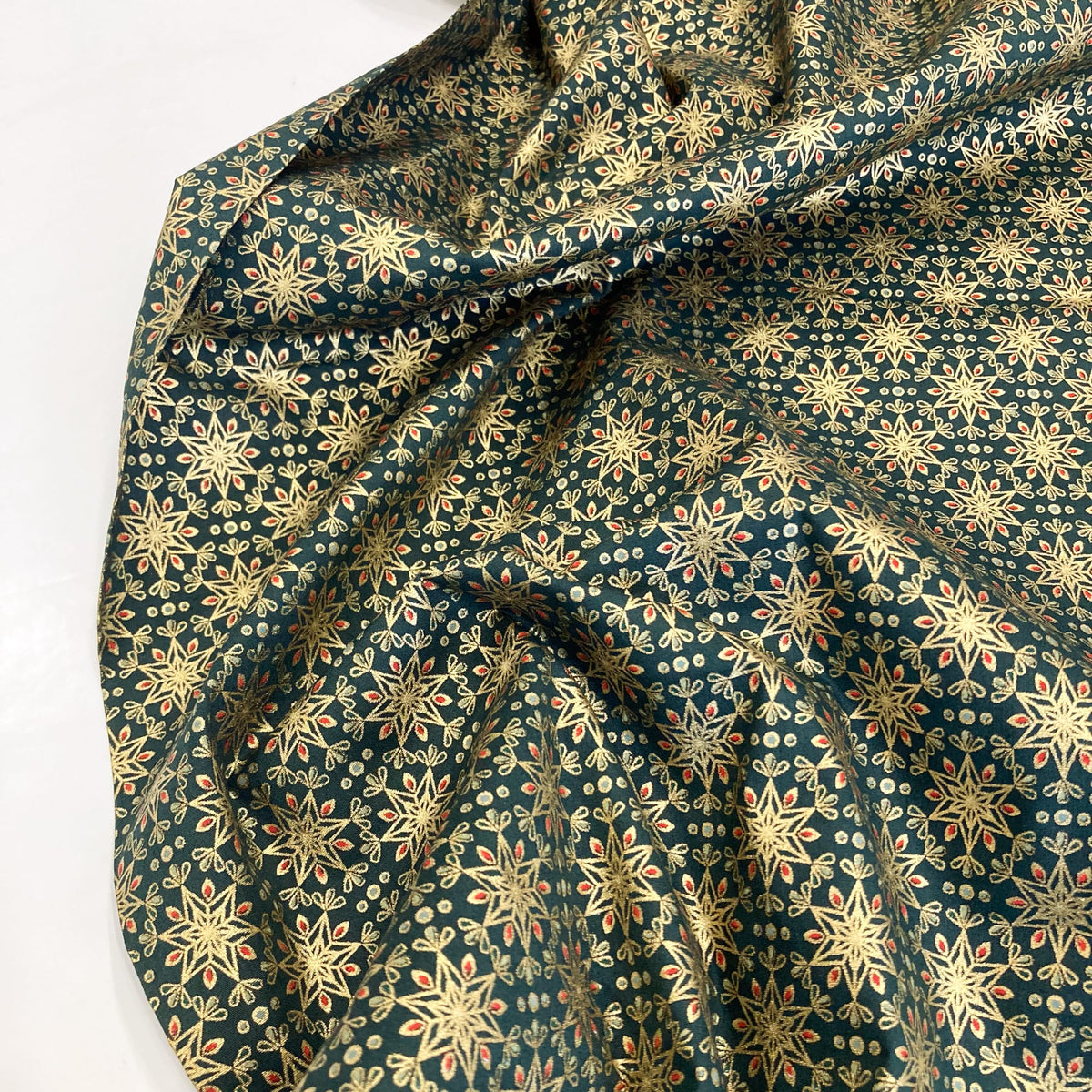 Cotton Poplin with Art Deco Stars in Bottle Green