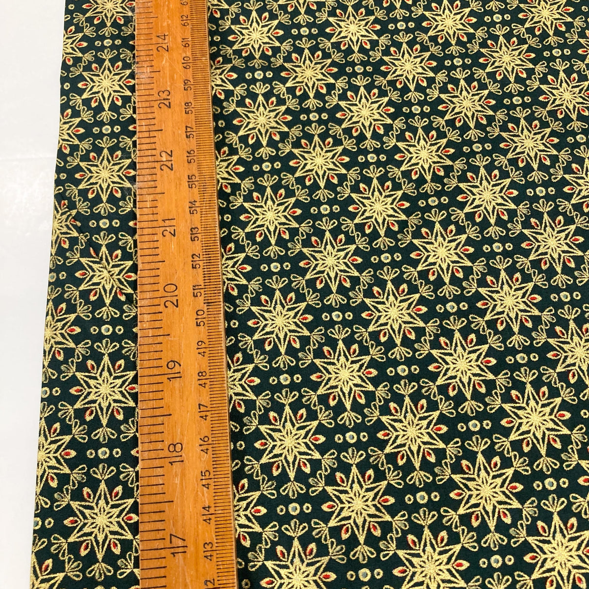 Cotton Poplin with Art Deco Stars in Bottle Green
