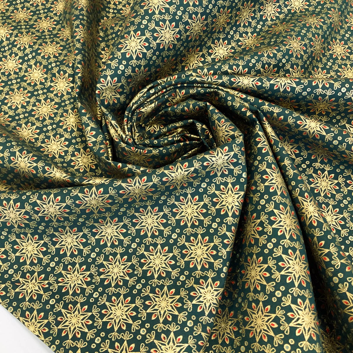 Cotton Poplin with Art Deco Stars in Bottle Green