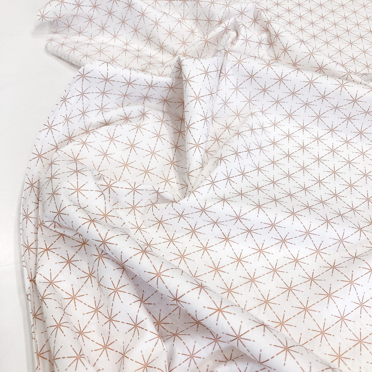 Cotton Poplin with Metallic Geo Star Print in Rose Gold