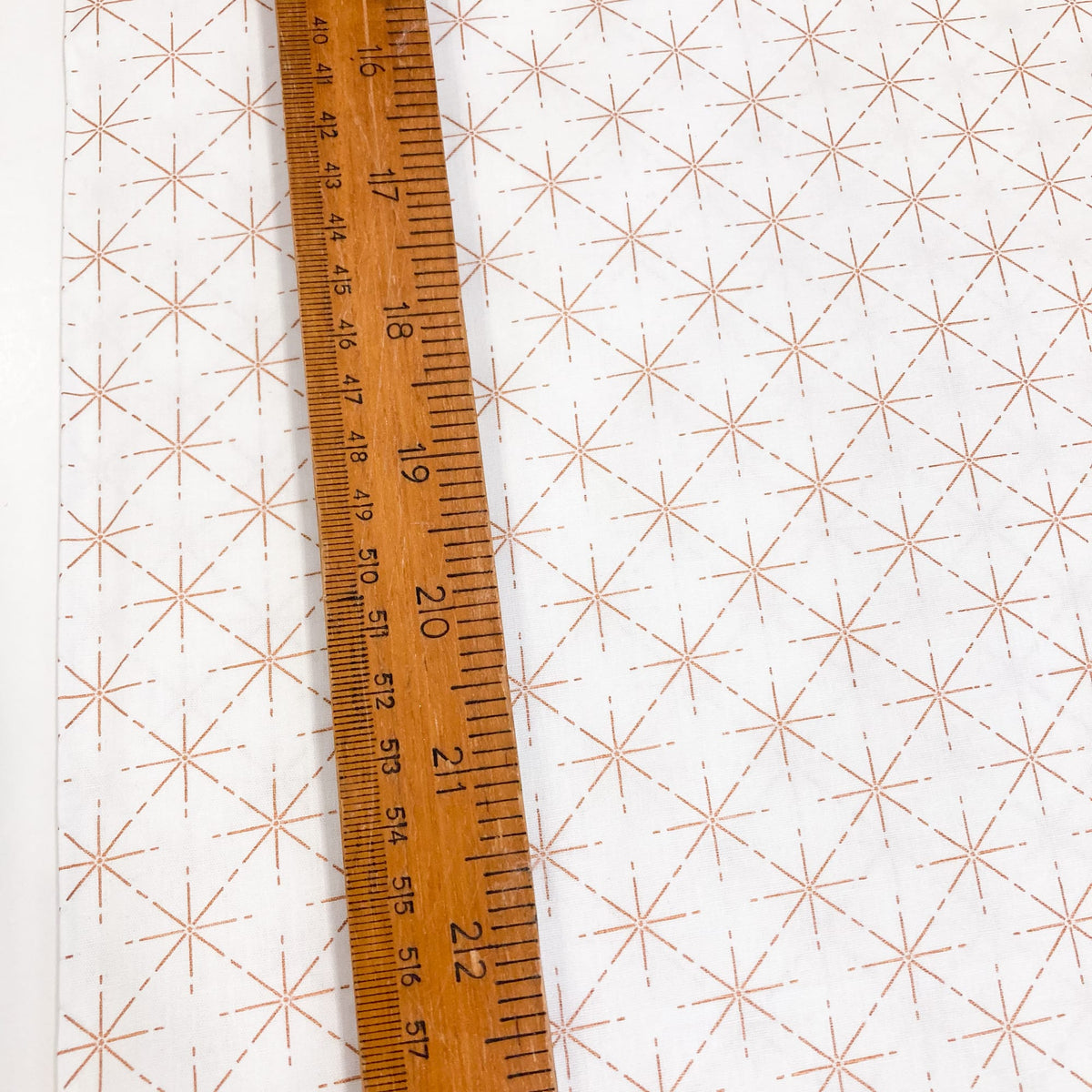 Cotton Poplin with Metallic Geo Star Print in Rose Gold