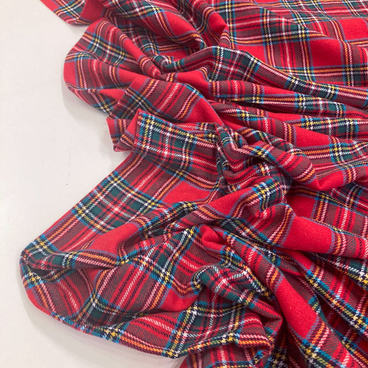 Red tartan brushed cotton  fabric with a white background