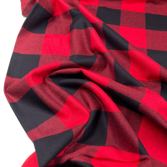Close-up of red and black buffalo check flannel fabric