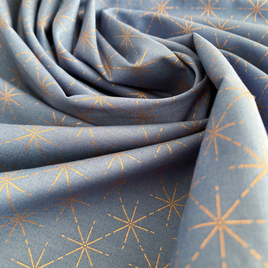 Cotton Fabric in Denim Blue with Metallic Starburst Print