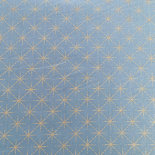 Cotton Fabric in Denim Blue with Metallic Starburst Print