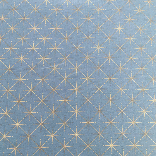 Cotton Fabric in Denim Blue with Metallic Starburst Print