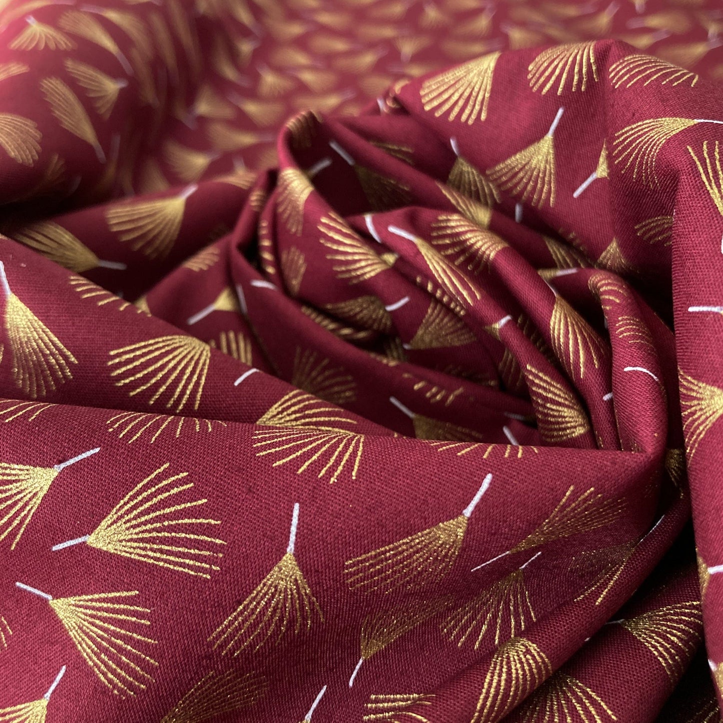Cotton Fabric in Burgundy with Metallic Pine Leaf Print