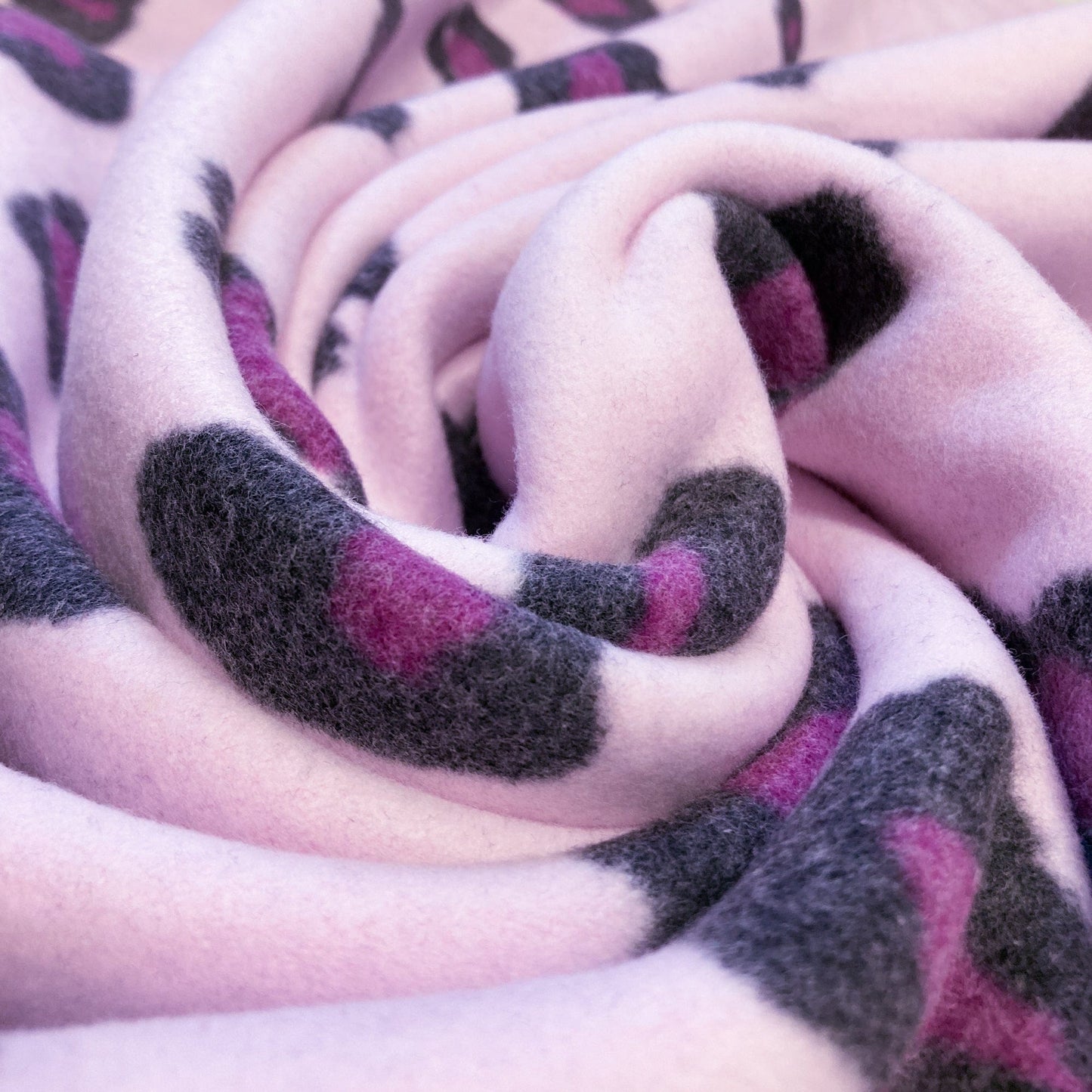 Organic Cotton Fleece with Snow Leopard Print in Pink