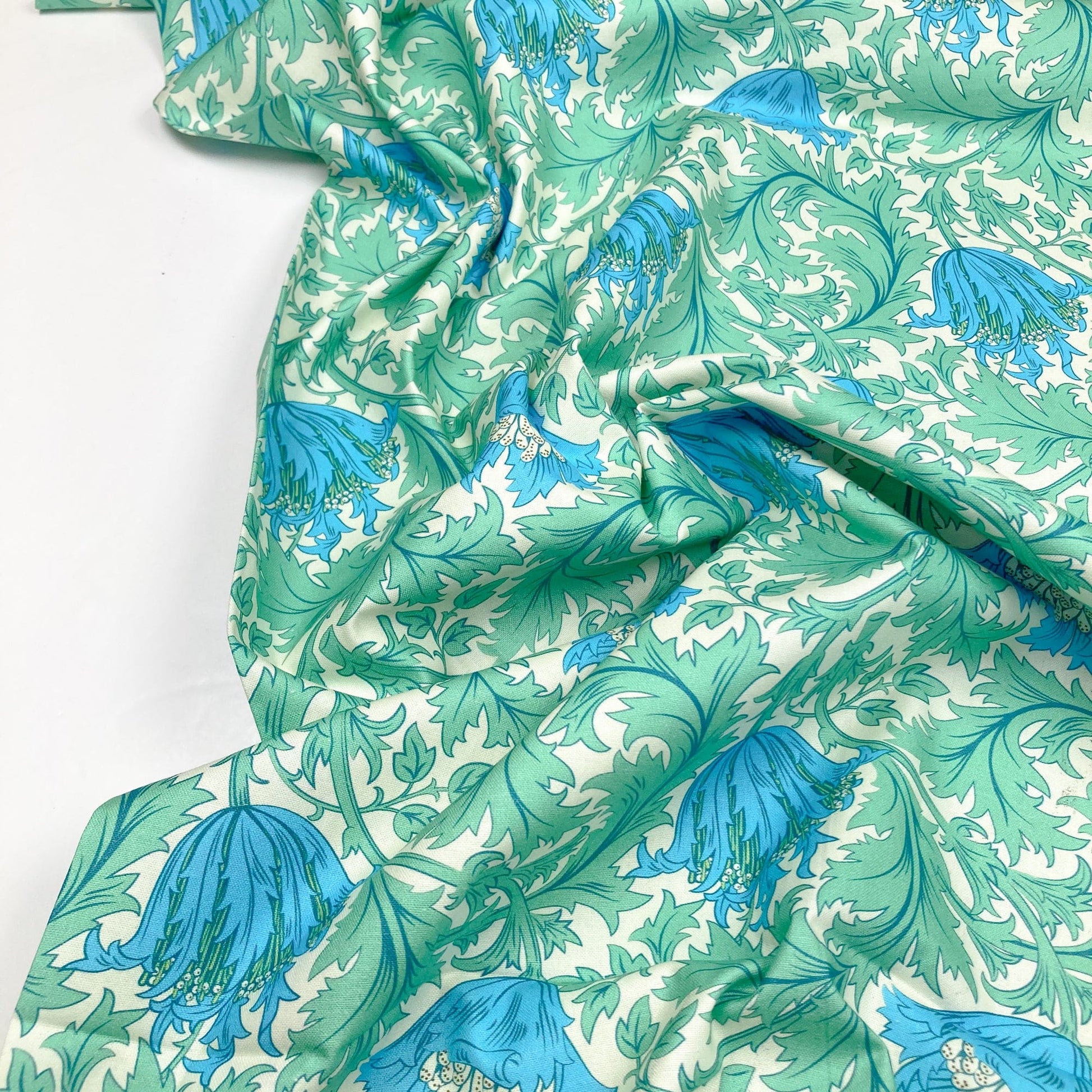 Cotton fabric with William Morris Style floral print in green and blue