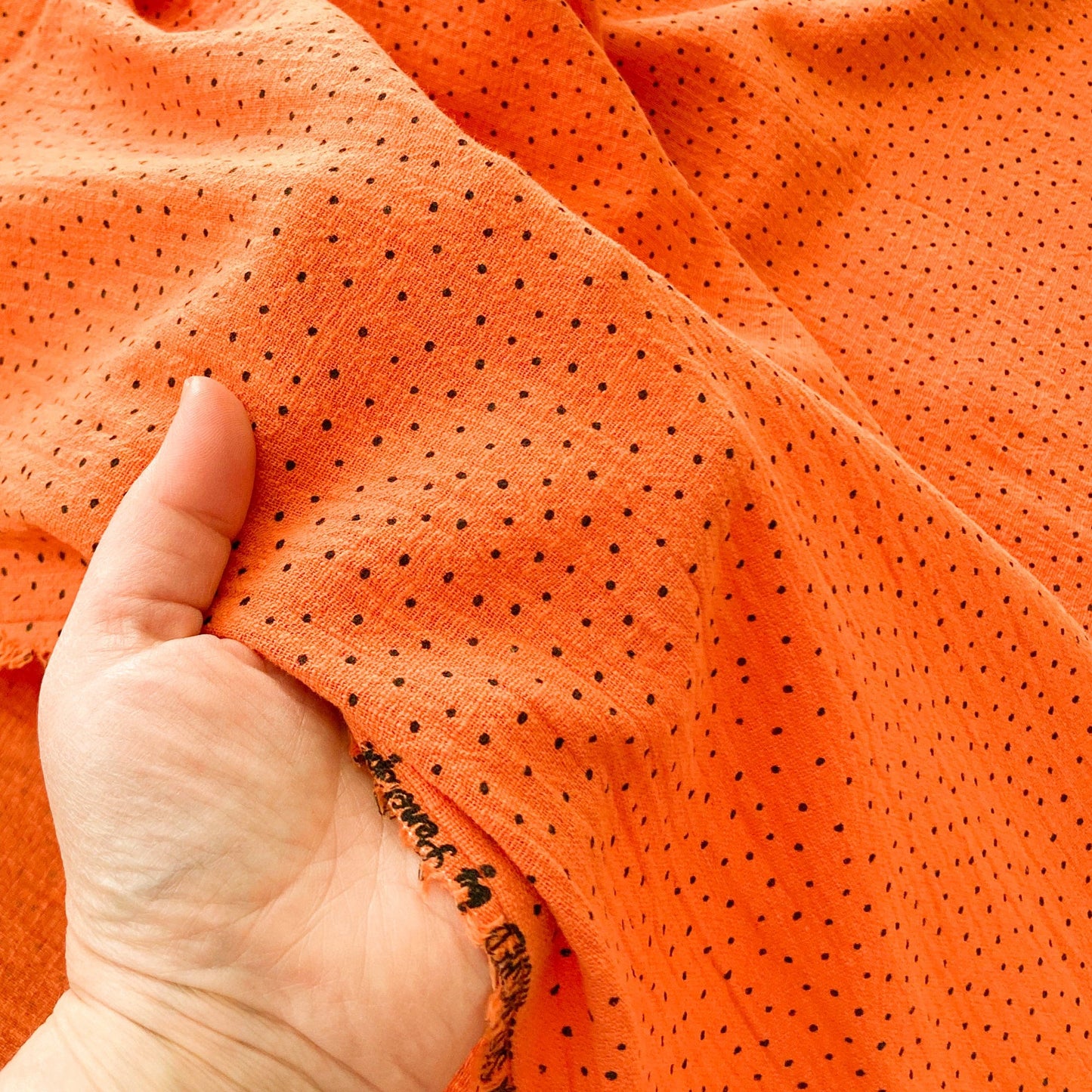 Cotton Cheescloth in Tangerine with Black Spots