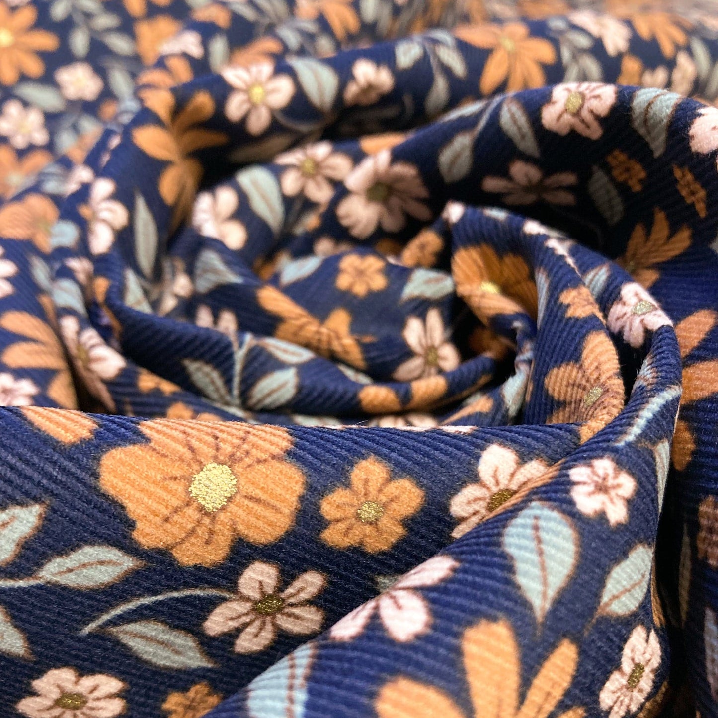 Cotton Needlecord in Navy with Metallic Floral Print