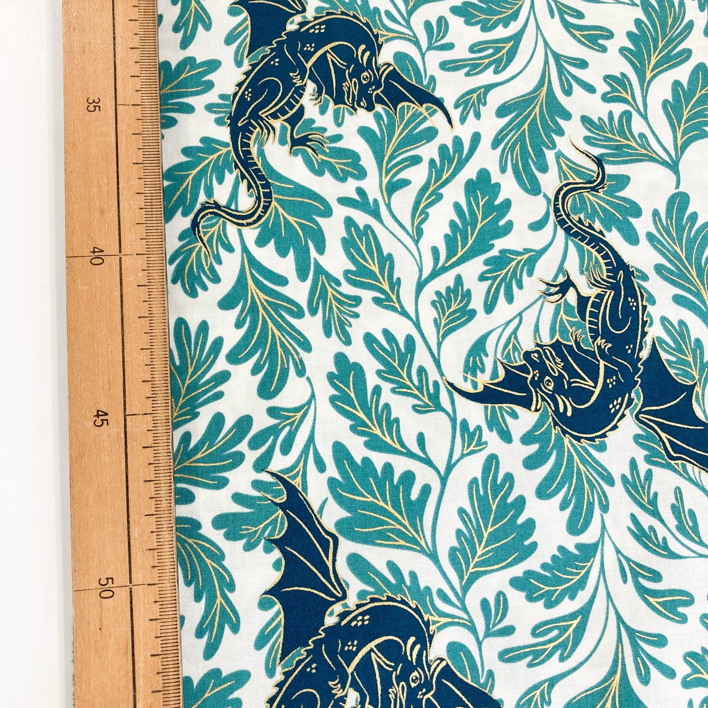Ruby Star Society 'Fireglow' Quilting Cotton 'Dragon Lair' in Watercress