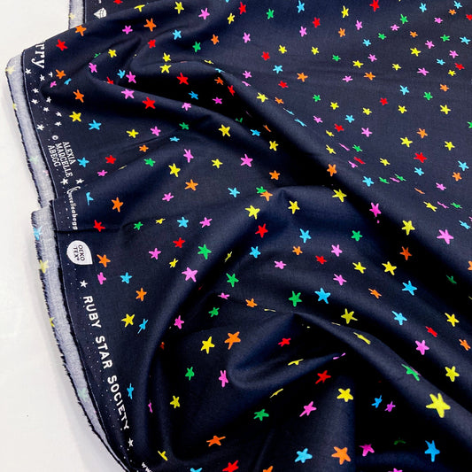 Black quilting cotton with colorful star pattern, featuring Ruby Star Society label.