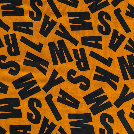 Fine Viscose in Rust Brown with Letter Print