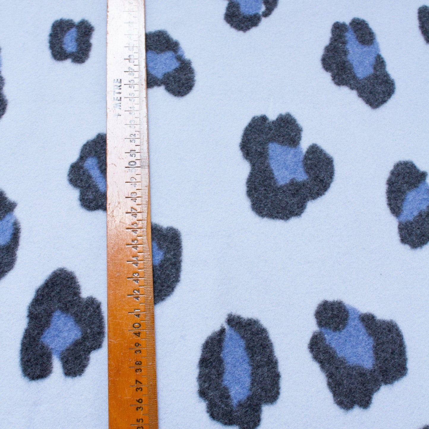 Organic Cotton Fleece with Snow Leopard Print in Blue