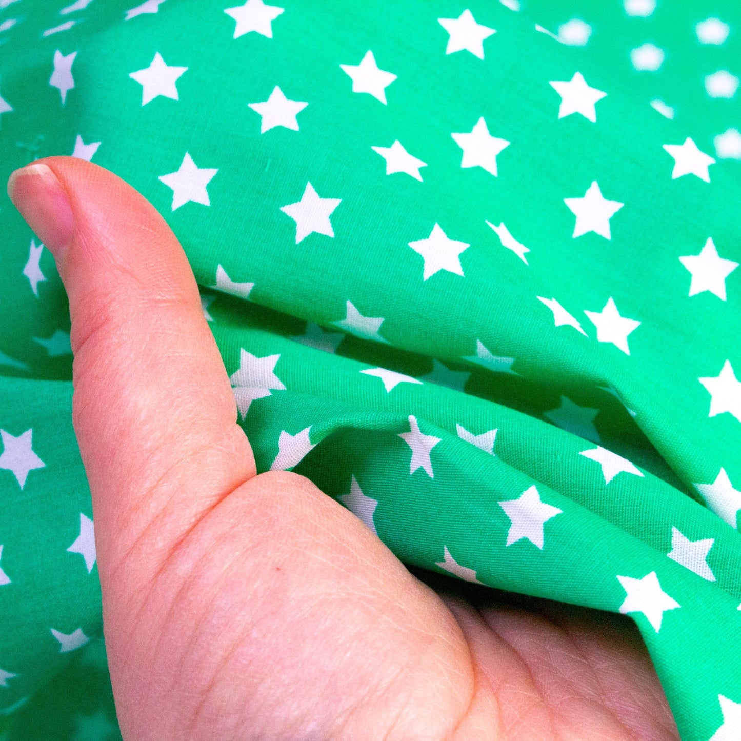 Cotton Poplin in Green with Star Print