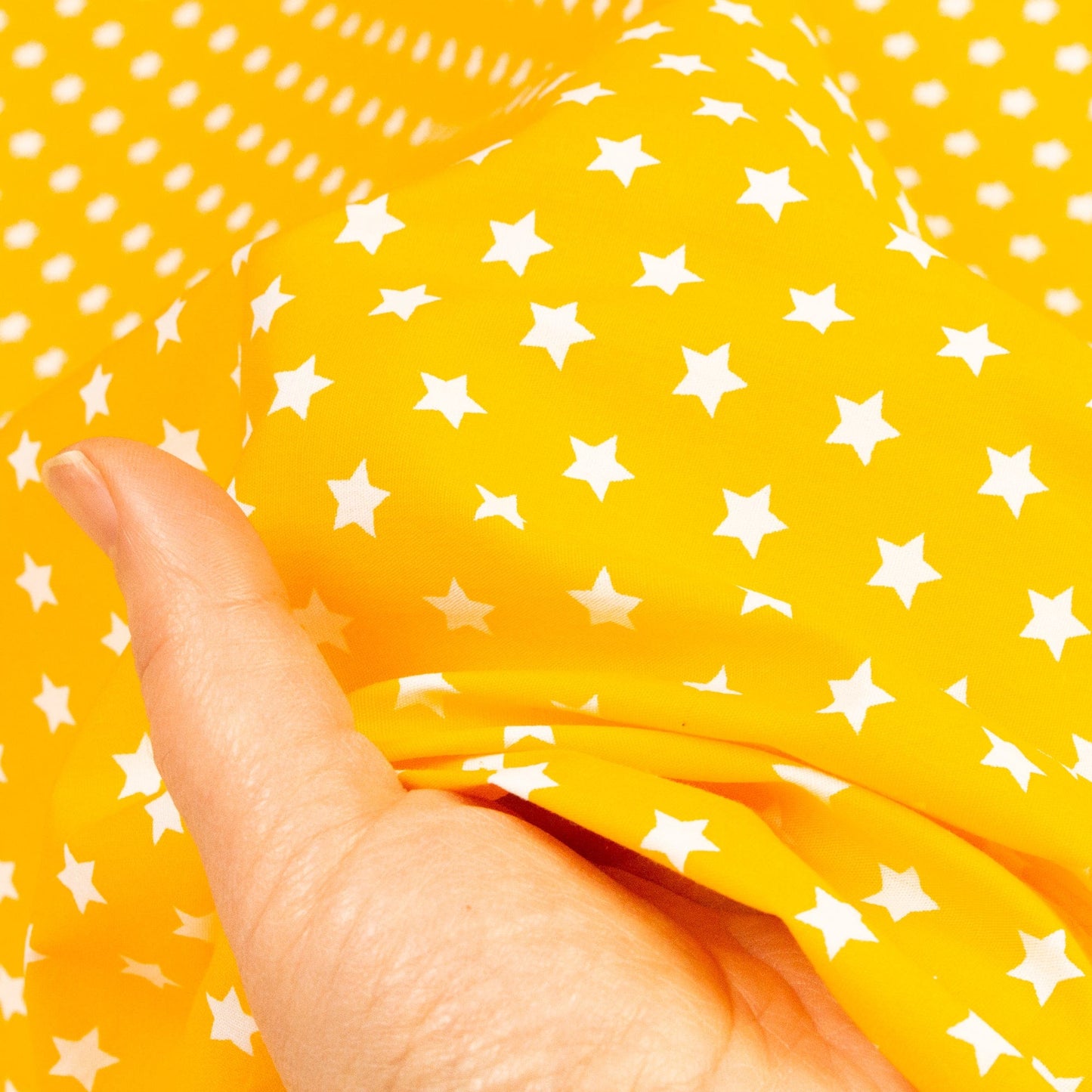 Cotton Poplin in Yellow with Star Print
